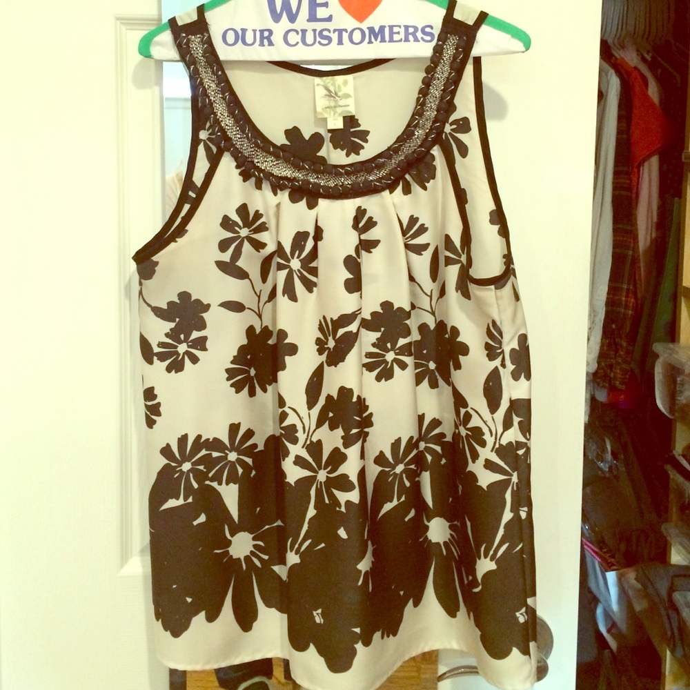 White and black floral top with silver detailing